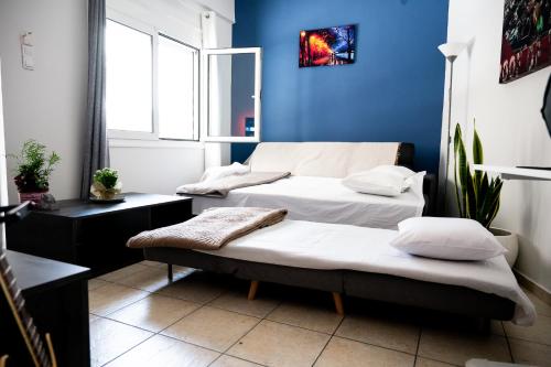 Cozy stylish apartment tesisinde bir odada yatak veya yataklar