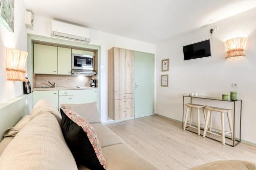 Dapur atau dapur kecil di Studio le Neptune - Appt à 100m de la plage