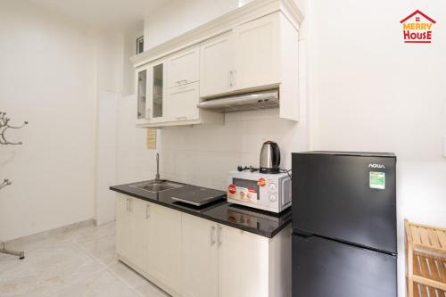 Dapur atau dapur kecil di Merry House Bạch Dương