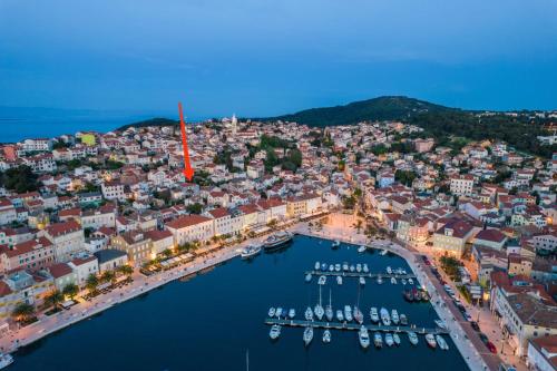 an aerial view of a city with boats in a harbor at Island Life in Mali Lošinj