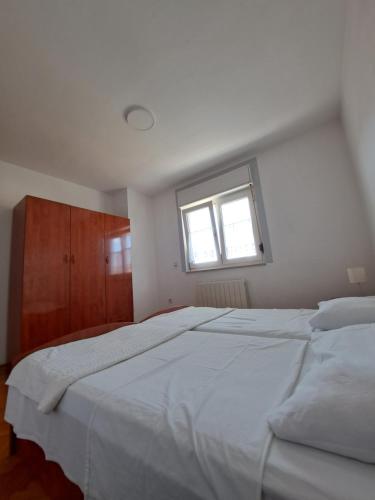 Ένα ή περισσότερα κρεβάτια σε δωμάτιο στο Guesthouse Varnica