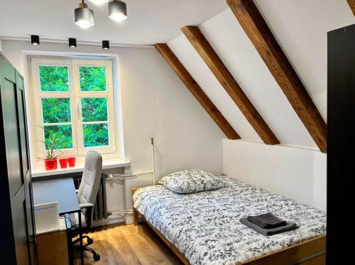 Posteľ alebo postele v izbe v ubytovaní ARSENAL apartment CITY CENTER Wrocław