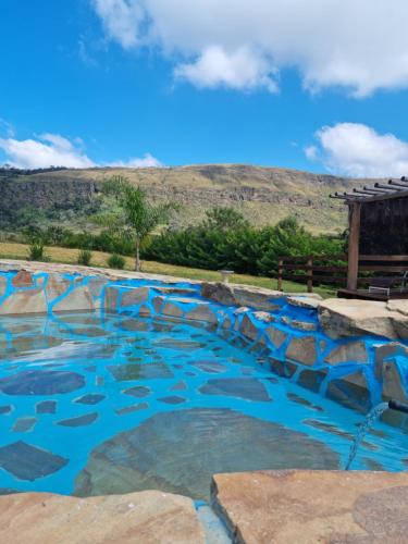 Piscina en o cerca de Chalés Encantos da Serra