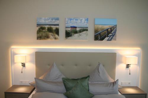 Ein Bett oder Betten in einem Zimmer der Unterkunft Hotel Inselhof Borkum