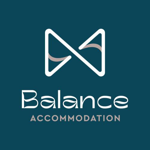 a logo for a dance association with a loudspeaker at Balance Accommodation in Stavros