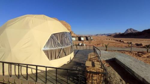 a tent in the middle of the desert at Jori Luxury Camp in Wadi Rum