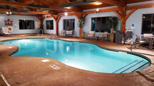 a large pool with blue water in a hotel at Holiday Inn Express & Suites Donegal by IHG in Donegal