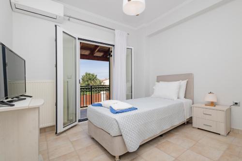 Tempat tidur dalam kamar di Mano's pool villa