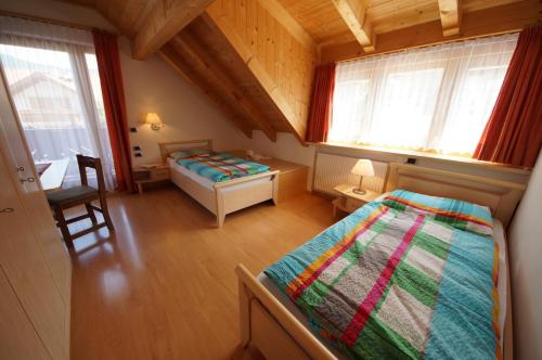 Säng eller sängar i ett rum på Residence Villa Toni