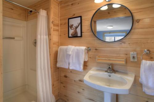 a bathroom with a sink and a mirror at Blessings in Creede