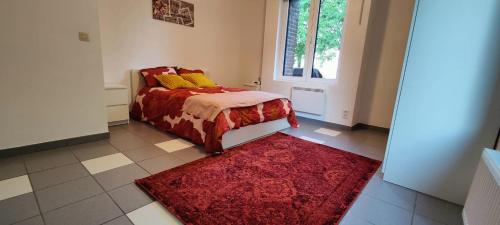 Cama o camas de una habitación en Chez Nous