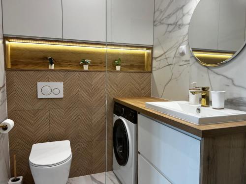 Koupelna v ubytování Apartament Iławka