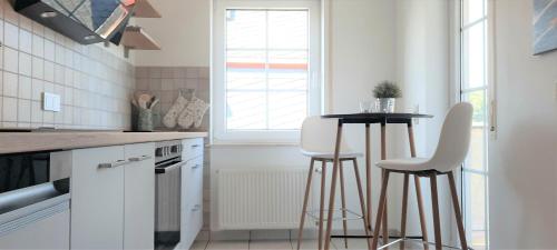 Η κουζίνα ή μικρή κουζίνα στο Apartments In Spay BigOne Zell-Merl Mosel