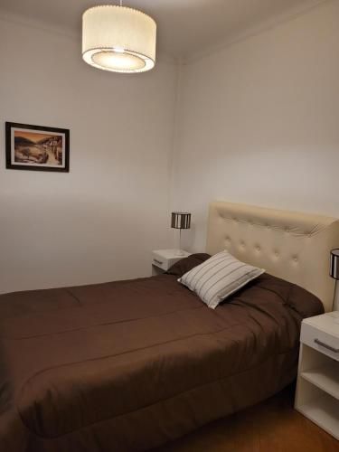 Кровать или кровати в номере APARTAMENTO ENCANTADOR