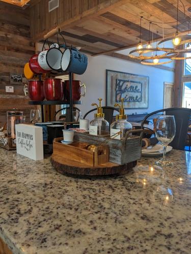 a counter in a kitchen with a counter top at Wine Time 5 Bedroom Shuffleboard Hot Tub Fire Pit Play Set in Broken Bow
