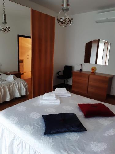 Ένα ή περισσότερα κρεβάτια σε δωμάτιο στο La casa di Paula
