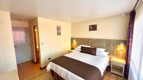 Ένα ή περισσότερα κρεβάτια σε δωμάτιο στο Hotel Canto del Mar