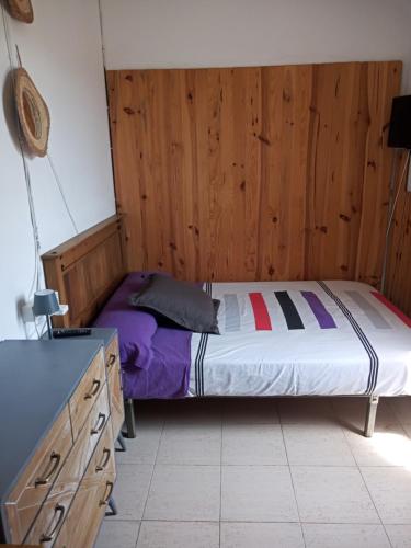 מיטה או מיטות בחדר ב-Casa campo