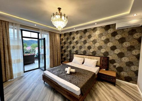מיטה או מיטות בחדר ב-Qafqaz Resort Emerald