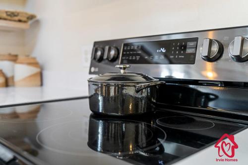 a pot sitting on top of a stove at Rancho de La Luna Casita in Santa Fe