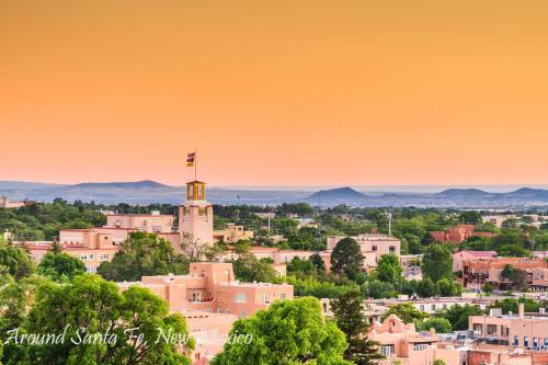 a view of a city with a clock tower at Rancho de La Luna Casita in Santa Fe