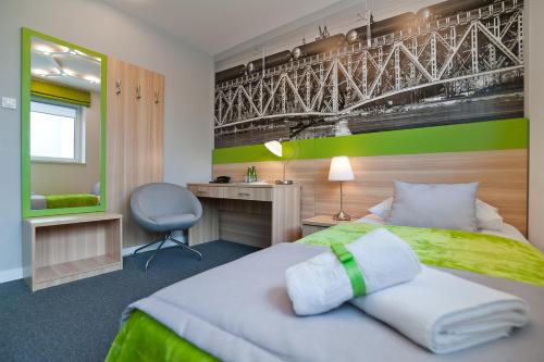 Ліжко або ліжка в номері Green Hotel Płock