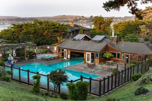 an aerial view of a house with a swimming pool at The Inn at the Tides in Bodega Bay