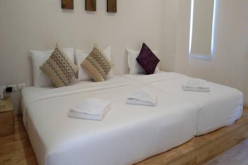 Postel nebo postele na pokoji v ubytování The Guest Arak Boutique Hotel