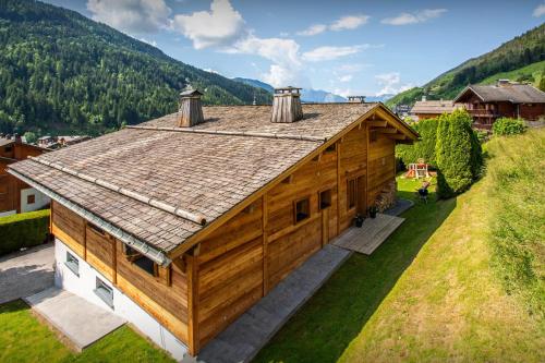 an overhead view of a house with a roof at Chalet Alyssum - OVO Network in Le Grand-Bornand