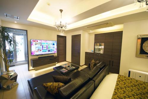 Televisyen dan/atau pusat hiburan di Hotel Lei