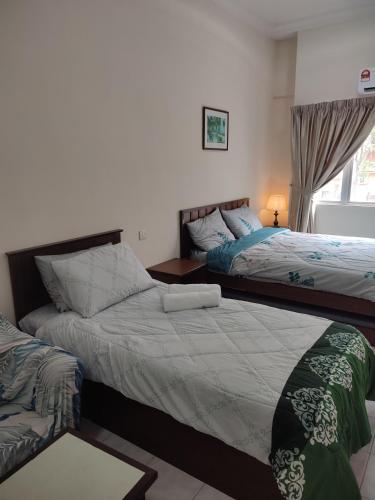 Katil atau katil-katil dalam bilik di Sofea Inn Bukit Merah - Laketown D6529