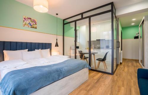 Postel nebo postele na pokoji v ubytování Devdaraki Apartments
