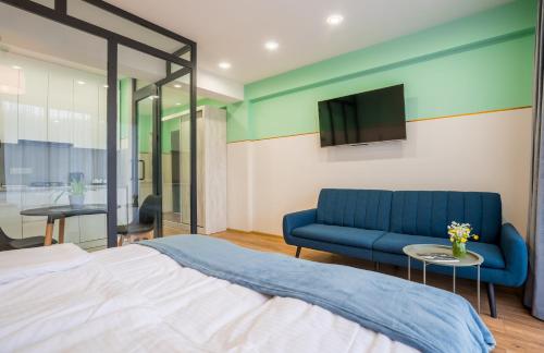 Postel nebo postele na pokoji v ubytování Devdaraki Apartments