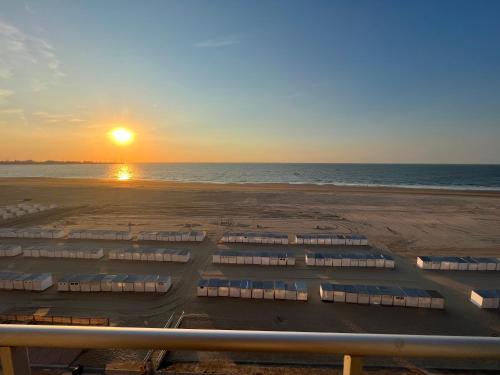 a view of a parking lot at the beach at Zeedijk family apartment in Knokke-Heist