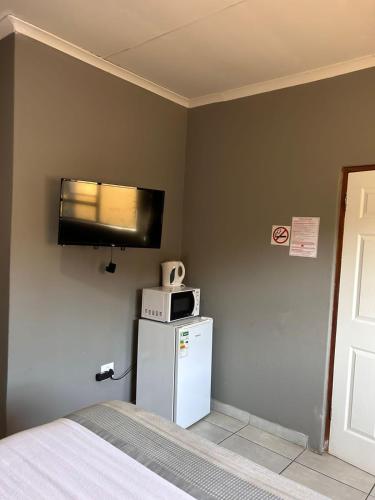 Kuchyň nebo kuchyňský kout v ubytování Platinum Guest lodge Germiston