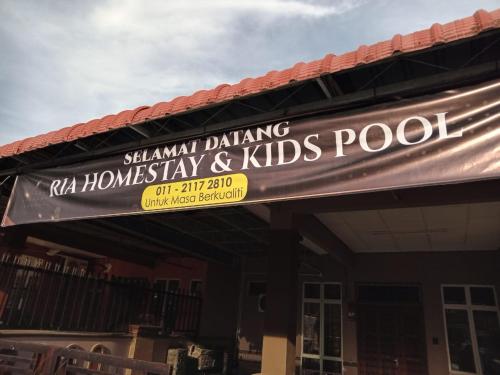 a sign for a shanghai dancing ministry and kids pool at Ria homestay & kids pool in Alor Setar