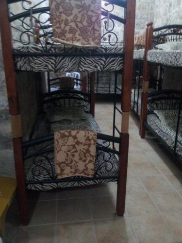 Cama ou camas em um quarto em Bab El-Silsileh Hostel