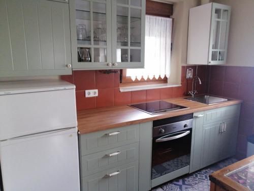 Kuchyň nebo kuchyňský kout v ubytování Casa Rural Calecha