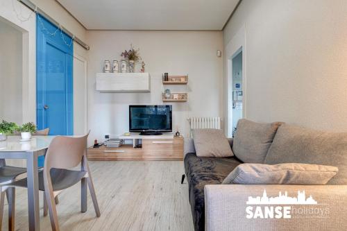 TV a/nebo společenská místnost v ubytování Apartamento Avenida by SanSe Holidays