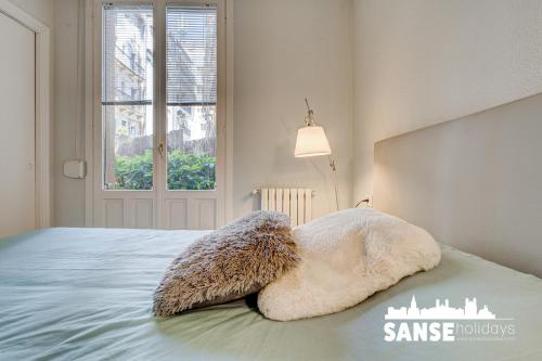Postel nebo postele na pokoji v ubytování Apartamento Avenida by SanSe Holidays