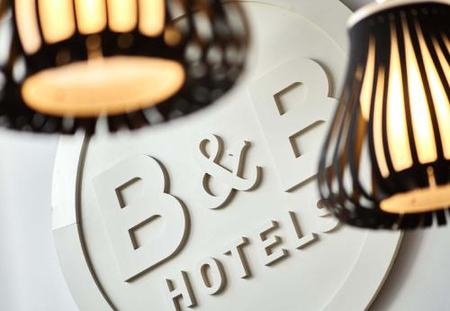 two lights on a plate with the words race hotter at B&B HOTEL Perpignan Centre in Perpignan