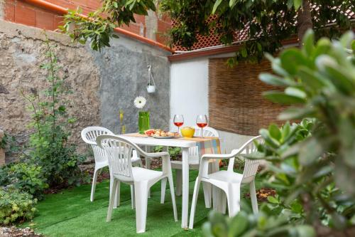 Fotografia z galérie ubytovania Casa vacanze con giardino - Twiggy's House v destinácii SantʼAntìoco