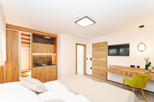 Kuchyň nebo kuchyňský kout v ubytování Medirooms Apartments