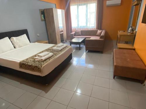 Katil atau katil-katil dalam bilik di City House Hotel