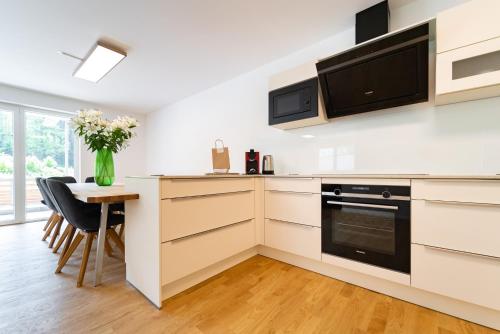 Una cocina o zona de cocina en Mit c