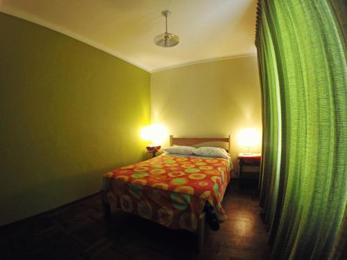 En eller flere senge i et værelse på La Casa de Arturo