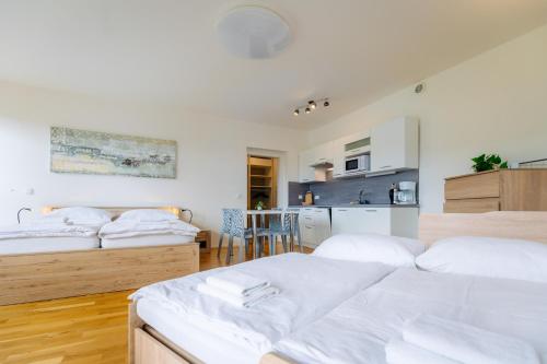 Postel nebo postele na pokoji v ubytování Horský apartmán Temari 12 Klínovec