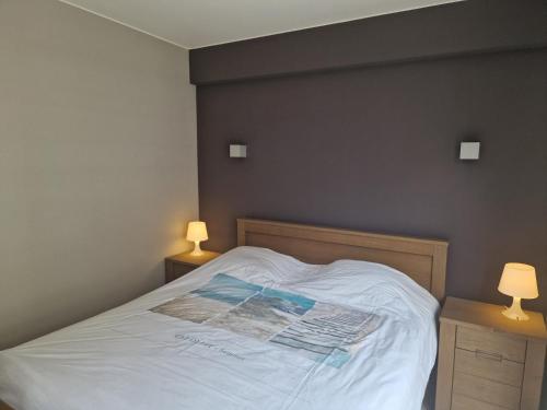 Oostduinkerke Apartments 2にあるベッド