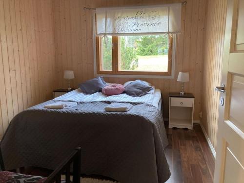 Postel nebo postele na pokoji v ubytování Villa Kupsala , LaatuLomat