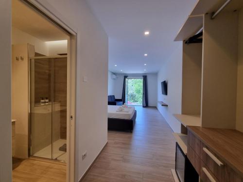 Katil atau katil-katil dalam bilik di Marea Retreat Rooms